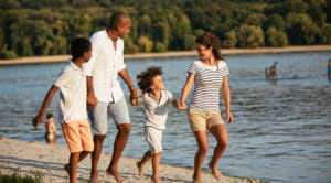 Family walking on a beach